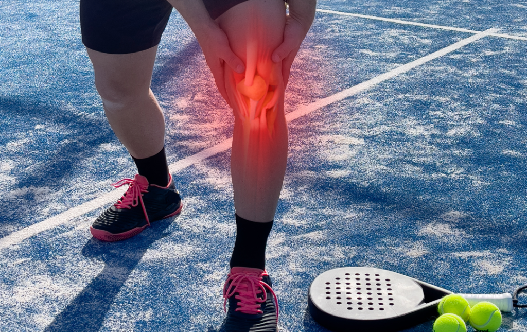A man experiencing sudden knee pain while playing tennis.