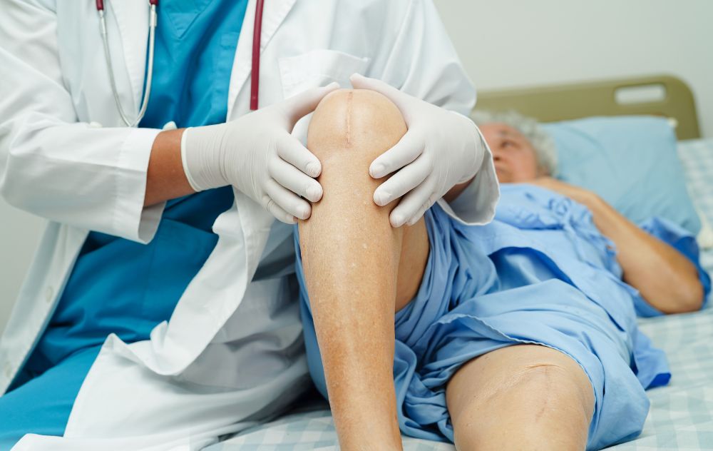 Patient discussing replacement results after being diagnosed with bone-on-bone arthritis